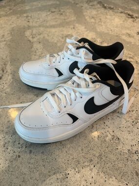 Nike White and Black Low-Top Sneakers with Swoosh